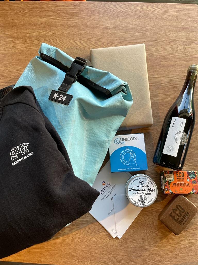 sustainable christmas gifts - carbon negative wine, m24 bags, shampoo bar